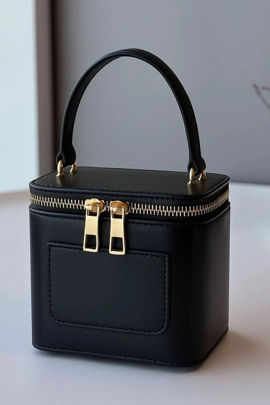 Çantë dore Zoozie, e zezë, MK1020225SV10-027 - 2