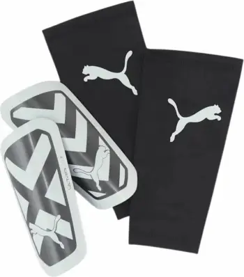Mbrojtëse për shin të meshkujve Puma, të bardha e të zeza