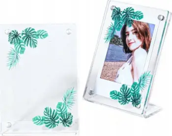 Kornizë LoveInstant Standing Frame Green Leaves, për foto Instax Mini, plastike transparente, me gjethe jeshile