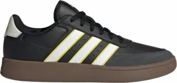 Atlete adidas, të bardha dhe të zeza
