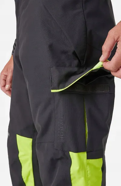 Pantallona dimri pune Helly Hansen Workwear Alna 2.0, Class 1, e verdhë e zezë - 1