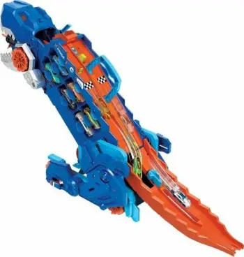 Set garazh/transportues dinosauri Mattel Hot Wheels City T-Rex Mega Transporter HNG50, me drita e tinguj, ruan 20+ vetura, me 2 vetura 1:64, blu/portokalli